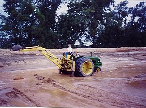 Lincoln on JD A with Backhoe